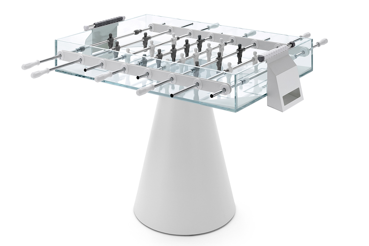 A tempered glass foosball table glass, named ghost, from Italian makers FAS Pendezza. Designed by Basaglia Rota Nodari, appears to levitate on a sleek cone base with crystal-clear playing field adorned with players and metal finishes.